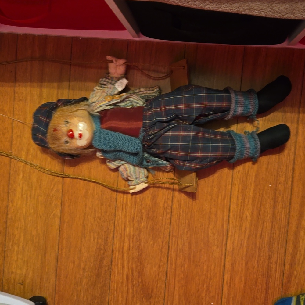 Old clown porcelaine doll